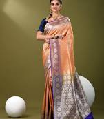 Orange  banarasi brocade saree with zari woven ethnic designs