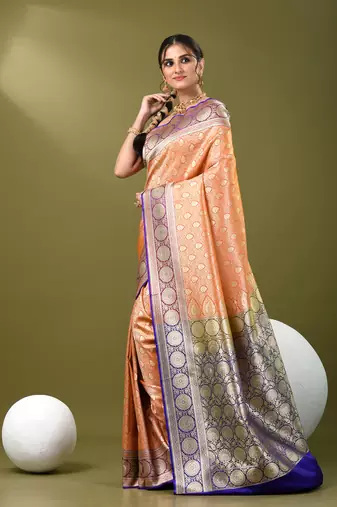 Orange  banarasi brocade saree with zari woven ethnic designs