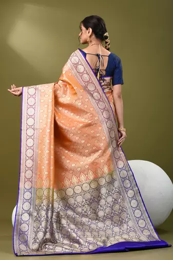 Orange  banarasi brocade saree with zari woven ethnic designs