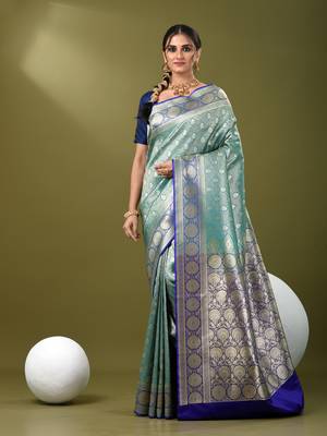 Teal  banarasi brocade saree with zari woven ethnic designs 1