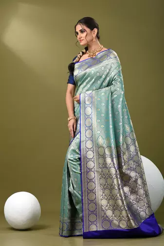 Teal  banarasi brocade saree with zari woven ethnic designs