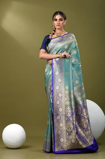 Teal  banarasi brocade saree with zari woven ethnic designs