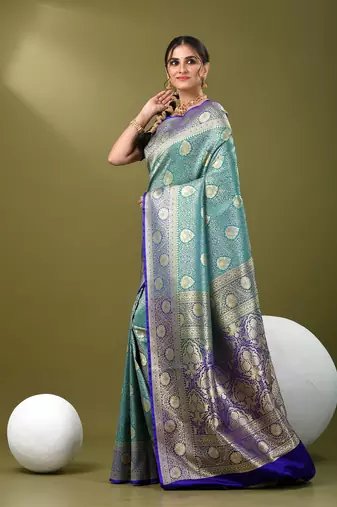 Teal  banarasi brocade saree with zari woven ethnic designs