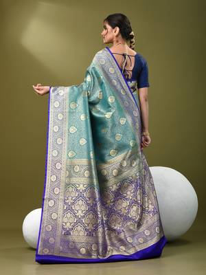 Teal  banarasi brocade saree with zari woven ethnic designs 3