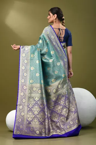Teal  banarasi brocade saree with zari woven ethnic designs