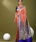 Red  banarasi brocade saree with zari woven ethnic designs