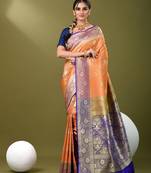 Orange  banarasi brocade saree with zari woven ethnic designs
