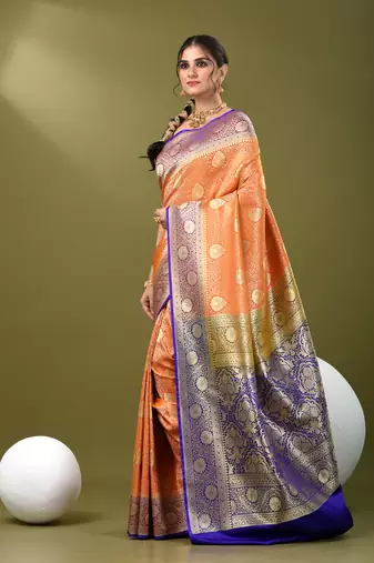 Orange  banarasi brocade saree with zari woven ethnic designs