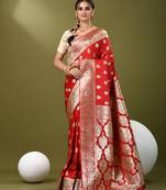 Red katan silk blend banarasi saree with zari woven ethnic designs