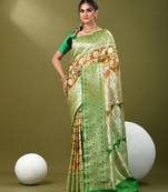 Brown katan silk blend banarasi saree with zari woven ethnic designs