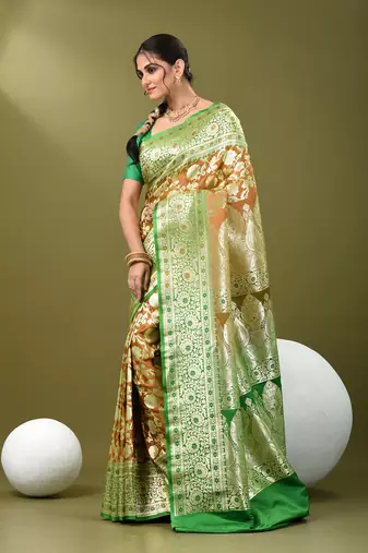 Brown katan silk blend banarasi saree with zari woven ethnic designs