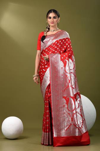 Red katan silk blend banarasi saree with zari woven ethnic designs