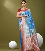 Sky blue katan silk blend banarasi saree with zari woven ethnic designs
