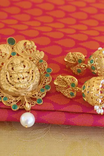 Temple lakshmi green color matte finish pendant set