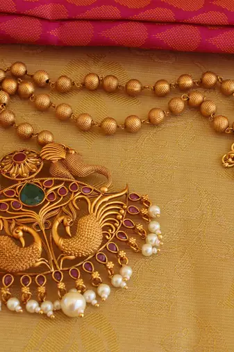 Matte finish peacock necklace