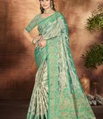 Teal blue organza woven work festival saree