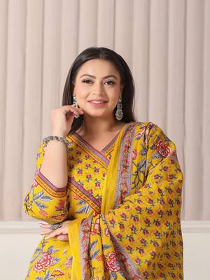 yellow floral print cotton cutdana work plus size kurta set with pant & dupatta 5