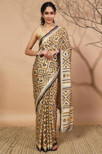 yellow Geometric printed saree with solid border