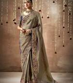 Chiku Tissue Dola Silk Zari With Weaving Heavy Embroidery & Heavy Designer Contras Blouse