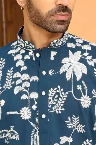Ethnic motifs embroidered georgette blue kurta