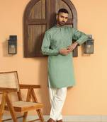 Cotton silk sequins work embroidered green kurta