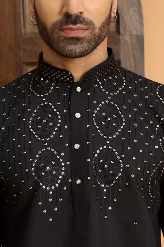 Cotton silk sequins work embroidered black kurta with cream patiala salwar