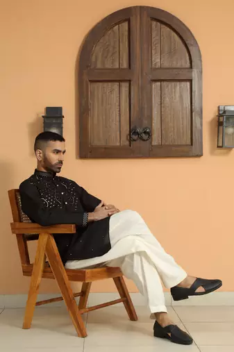 Cotton silk sequins work embroidered black kurta with cream patiala salwar