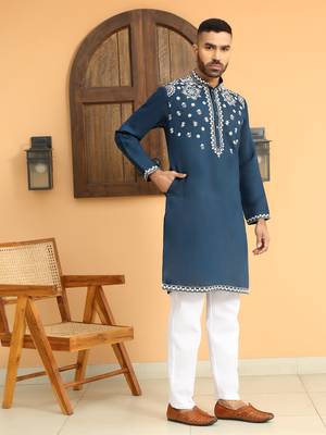 Embroidered sequenced cotton silk blue kurta with white trouser pant 5