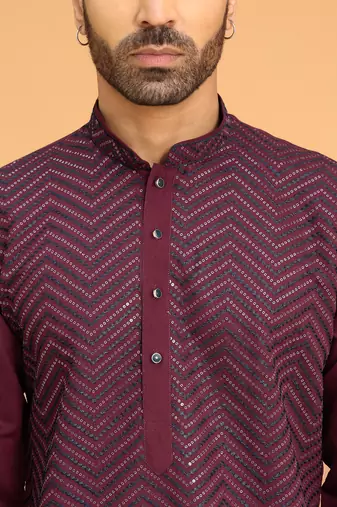 Cotton silk chevron embroidered maroon kurta and white trouser pant