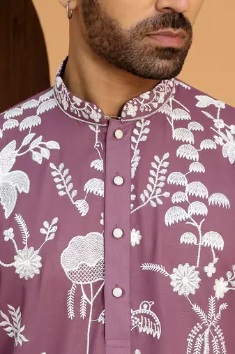 Ethnic motifs embroidered georgette mauve kurta with trouser pant