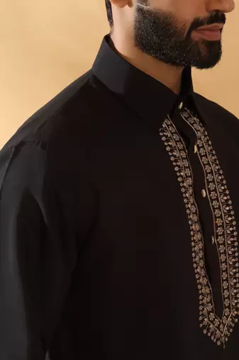 Cotton silk sequined embroidered yoke design black kurta with beige patiala salwar