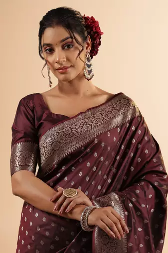 maroon banarasi art silk saree with silver zari buti & ornate border