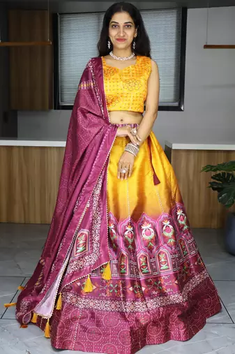 yellow color printed art silk haldi lehenga set choli with dupatta