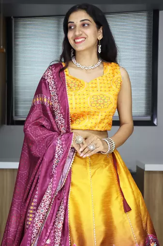 yellow color printed art silk haldi lehenga set choli with dupatta