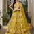 mustard yellow embroidered net haldi lehenga set choli with dupatta