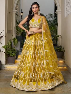mustard yellow embroidered net haldi lehenga set choli with dupatta 3