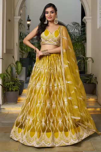 mustard yellow embroidered net haldi lehenga set choli with dupatta