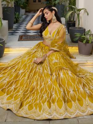 mustard yellow embroidered net haldi lehenga set choli with dupatta 4