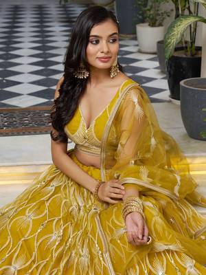 mustard yellow embroidered net haldi lehenga set choli with dupatta 5