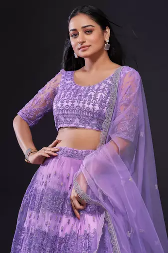 Lavender Embroidered Net Lehenga Choli.