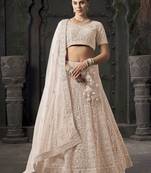 Cream Zarkan Work Net Wedding Lehenga Choli With Dupatta