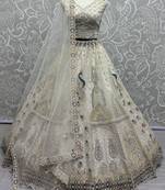 Off-White Sequins Net Wedding Lehenga Choli With Dupatta