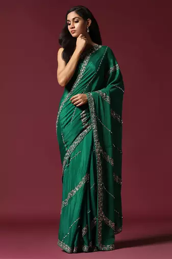 Green embroidered & embellished saree