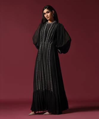 Black gown embellished with pearls and antique silver cutbeads with belt 1