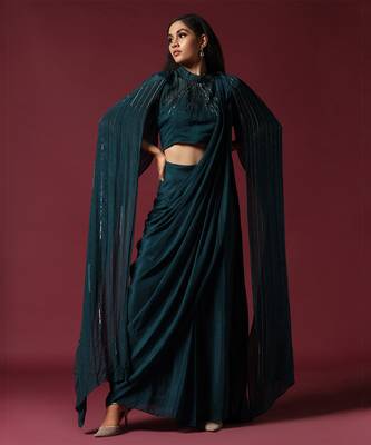 Teal green pre-draped saree with a shoulder cape 1