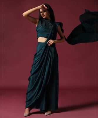 Teal green pre-draped saree with a shoulder cape 4