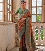 brown banarasi silk blend zari woven traditional saree with blouse