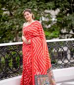 Women's red tussar silk leheriya print with zari border saree with blouse