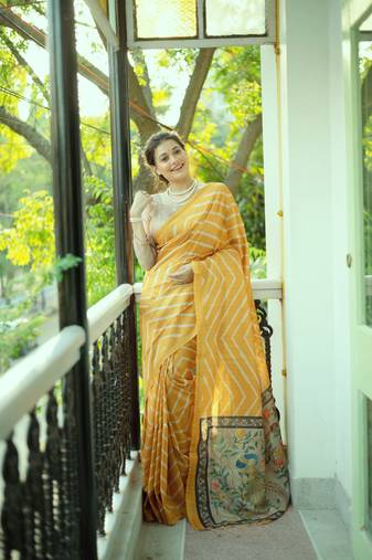 Women's yellow tussar silk leheriya print with zari border saree with blouse