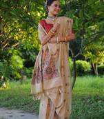 Women's beige soft muga cotton floral weaving traditional saree with blouse